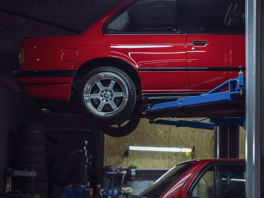 Car raised on a lift in the shop
